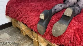 Slave's lickin street dirt from the soles of My ankle boots after the concert and then I trample his palms