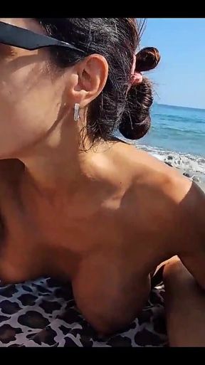 Between and Passers-by, We Try to Relax on the Beach