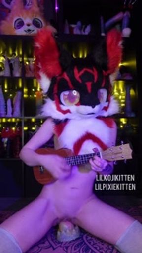 Sibging and playing Fireflies by Owl City while riding a dildo