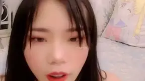 Skinny Asian Chick Playing With Toy