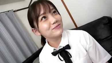 Young Asian student teases her date in school style before going down on him