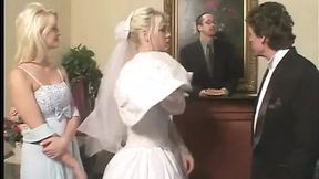 Blonde bride gets gangbanged in bed by two cocks.