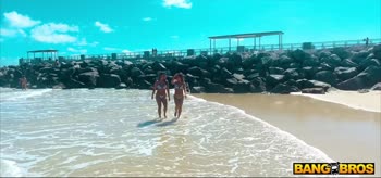 Bikini Babe Sizzles on South Beach in a Shower Showdown