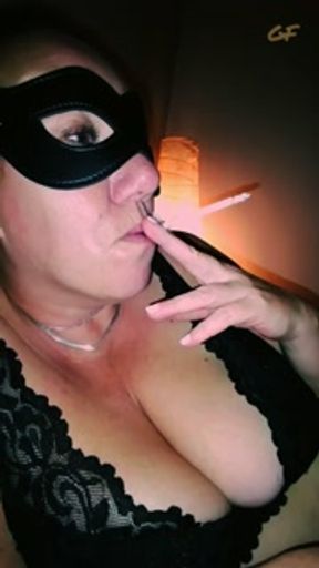 with a cigarette in bed