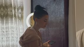 HANDY SMOKING HER CIGARETTE IN A TRACKSUIT COMBINATION