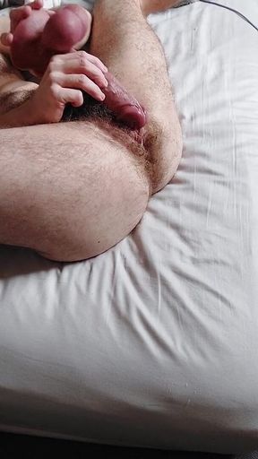 Ftm Boy Fucking His Hairy Pussy with a Huge Dildo and Squirting All Over the Bed
