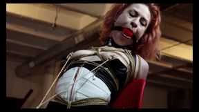 ball gagged nipples clamped rope bondage to a chair