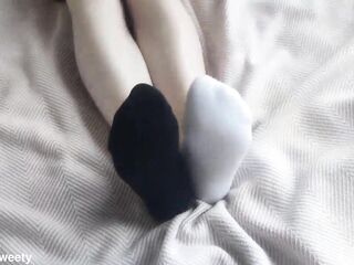 Mismatched ebony and white ankle socks for a carnal Sockjob