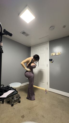 Hot trans in her sexy gray dress teasing her huge tits and ass