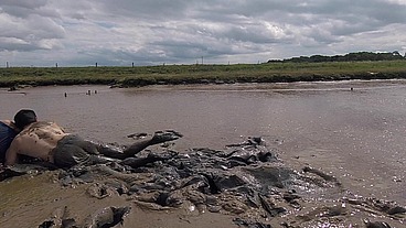 Mud Wrestling--Who Wins, Women or Man! (WAM, Wet and Messy)