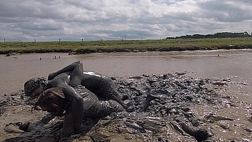 Mud Wrestling--Who Wins, Women or Man! (WAM, Wet and Messy)