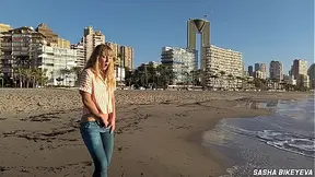 Risky masturbation on a public beach in Benidorm  Fetish Wet Sneakers  The girl pees beautifully in jeans  Fingering  Russian pornstar Sasha Bikeyeva