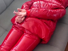 Slave tied in shiny puffer