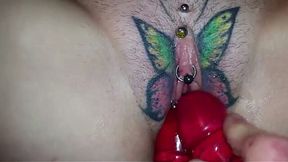 Lewd slut with a butterfly tattoo on her pussy just loves anal sex