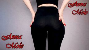 Wearing black cotton leggings, I stroke my ass and spank my ass as hard as I can