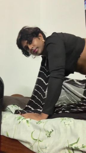 Curvy black sissy crossdresser sits and plays with her dress