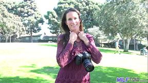 Tall brunette MILF photographer fucks young guy in her studio