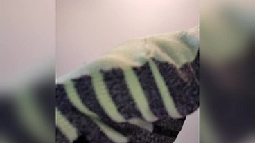TOMAS shows us his feet, after sweating allá day