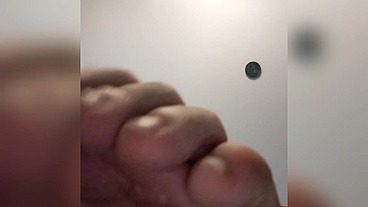 TOMAS shows us his feet, after sweating allá day
