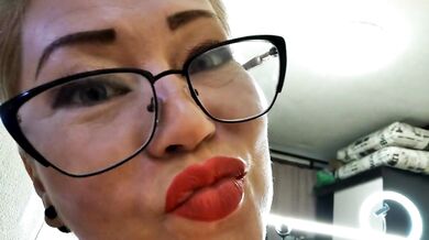 Blonde milf in red lingerie deepthroats cock with glasses