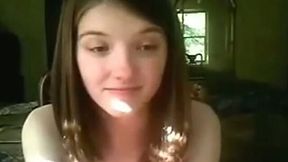 Short haired teen brunette with pretty face masturbates her fresh pussy