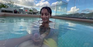 She sucks my dick a little bit and jerks me off in the pool