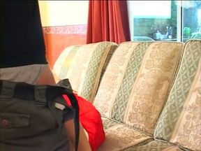 Foxy cowgirl fingering her cunt on the couch before sucking a dick