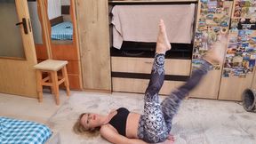 stretching while i wear sport bra and yoga pants
