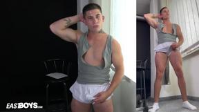 ”Twink muscle bulk boy flexing with boner”