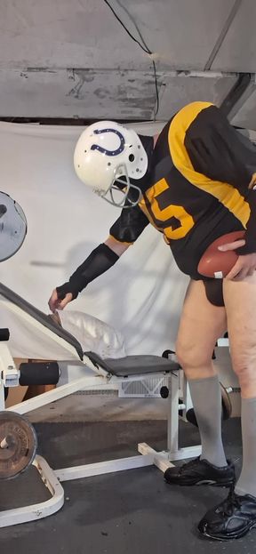 Football jock takes it after practice