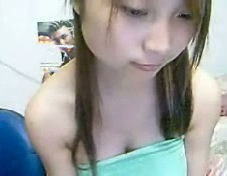 Korean webcam teen with big tits flirts with me showing her goodies