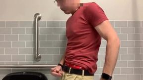 Masturbating in a public bathroom and cumming