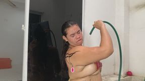 SUMMER GIRL HAS FUN WITH THE HOSE WATER