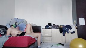 Amateur wife has fun trying on clothes that she cuts herself. Amateur wife dances naked around the house.