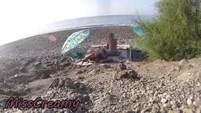 Public MILF gets huge cock at nude beach