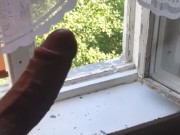 Russian boy jerking off in front of the window