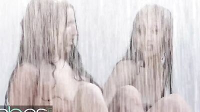 Two big tit wet lesbians rub their teen pussies in the rain - BABES