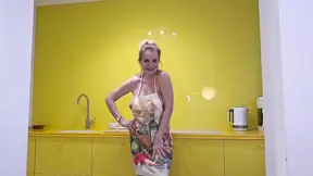 Female chef eats juicy fruit salad in a playful scene