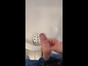 boy jerking and cumming in urinal