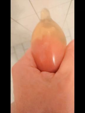 Erika Oak Pisses In A Latex Condom