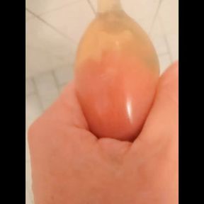 Erika Oak Pisses In A Latex Condom