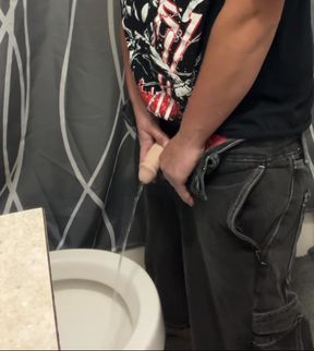 Trans guy pees while his partner watches