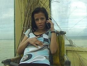 Hot chick with small tits talks on the phone