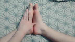 Guy Gently Massages His Feet with Oil