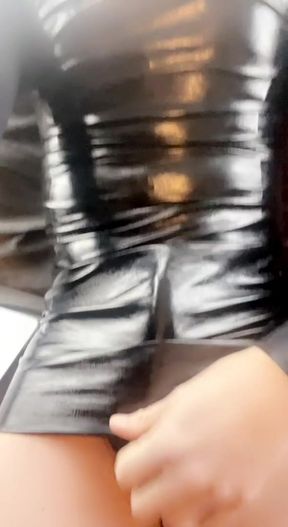 Crossdressing sissy in latex plays with her curves