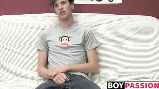 Adorable gay guy Danny jerks off his dick on couch solo