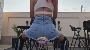 DENIM SKIRT GODDESS SQUASHING DOLL FACES & FARTS WITH LEATHER BOOTS.