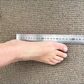 TinySizedFeet Measuring against ruler and home items