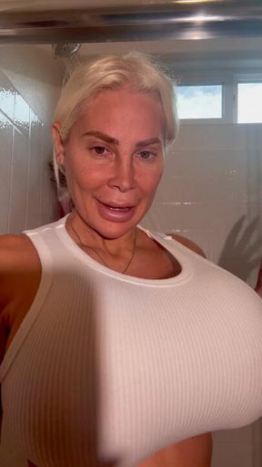 Showering getting my  T shirt and  panties  come watch me titty fuk my huge Titts and cum watch me cum