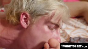 Skinny blond twink enjoys a raw bareback session after mutual feet licking and shoots his load